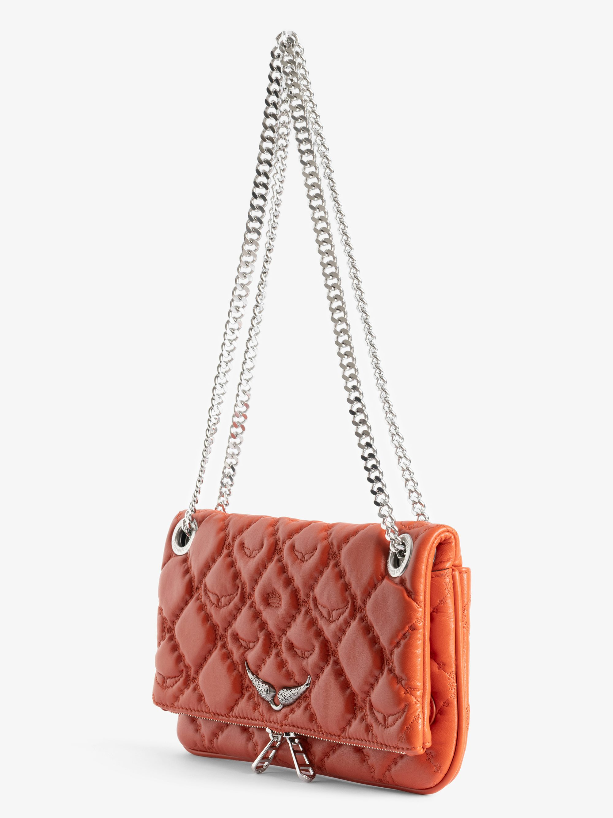 Rock II Quilted Monogram Clutch - Clutch in smooth quilted leather with sliding metal chain and signature wings.
